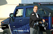 California Gov. Arnold Schwarzenegger tanks up the first hydrogen Hummer in California. In the future, hydrogen cars could not only power themselves, but also homes and a national power grid.