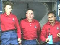 Discovery crew members (left to right) Eileen Collins, Stephen Robinson and Charles Camarda