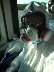 Tomohiko Suzuki, in full protective gear, near the Fukushima No. 1 nuclear plant on July 18. (Photo courtesy of Tomohiko Suzuki)