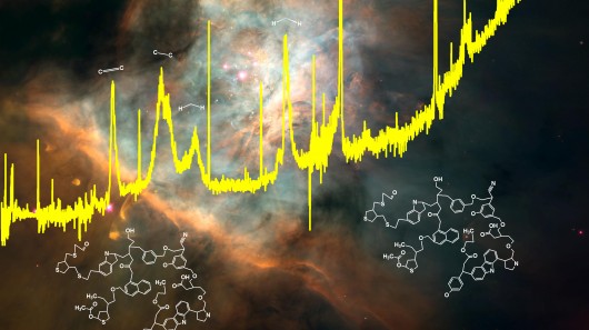 A spectrum from the Infrared Space Observatory superimposed on an image of the Orion Nebul...