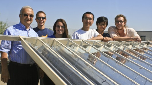 Professor Roland Winston and his student team, with an array of External Compound Paraboli...