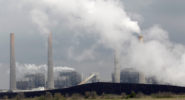 Piles of coal are shown at NRG Energy's W.A. Parish Electric Generating Station in Thomsons, Texas. | AP Photo